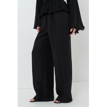 Pantaloni evazati din amestec de lyocell cu buzunare laterale