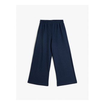 Pantaloni texturati cu croiala ampla si talie elastica