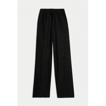 Pantaloni semi-transparenti cu talie inalta