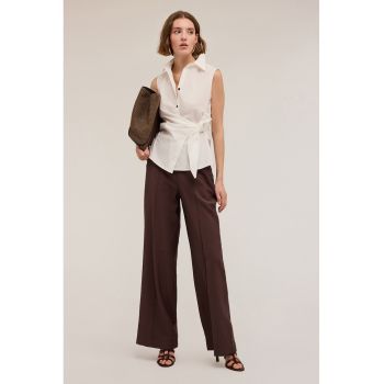 Pantaloni cu croiala ampla si buzunare laterale