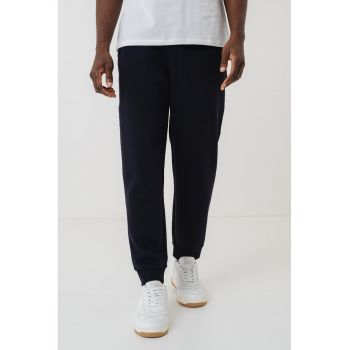 Pantaloni conici de trening