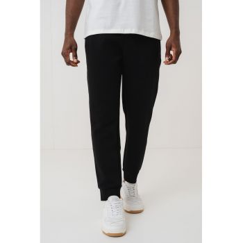 Pantaloni conici de trening