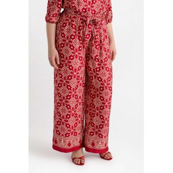 Pantaloni ampli cu model floral
