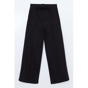 Pantaloni de trening cu model uni si talie elastica