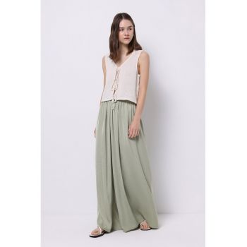Pantaloni cu croiala ampla - pliuri si talie elastica