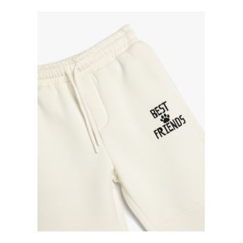 Pantaloni de trening cu snur de ajustare si buzunare