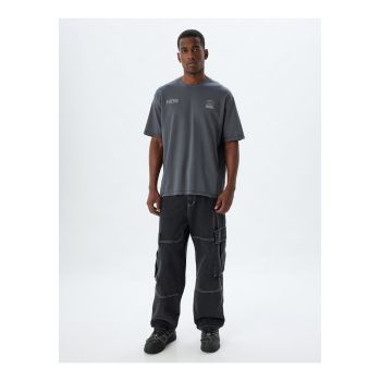Tricou supradimensionat cu maneci cazute