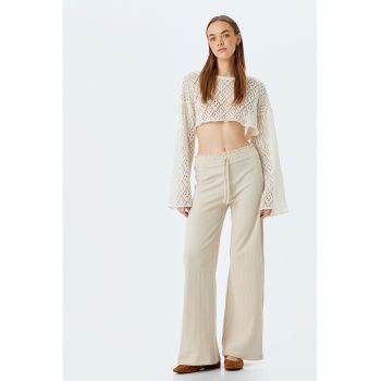 Pantaloni cu croiala ampla si talie ajustabila