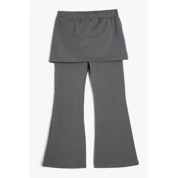 Pantaloni evazati din bumbac cu fusta integrata