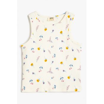 Top cu model floral si aspect striat