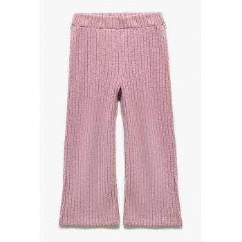 Pantaloni cu croiala ampla si model uni