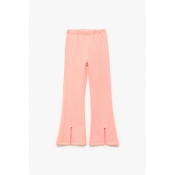 Pantaloni evazati cu slituri frontale