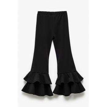 Pantaloni evazati cu volane