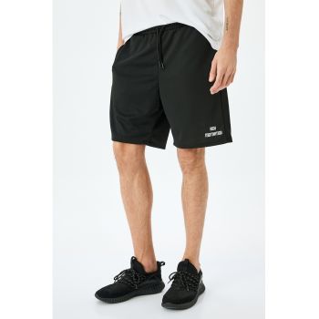 Pantaloni scurti de trening cu talie elastica si snur